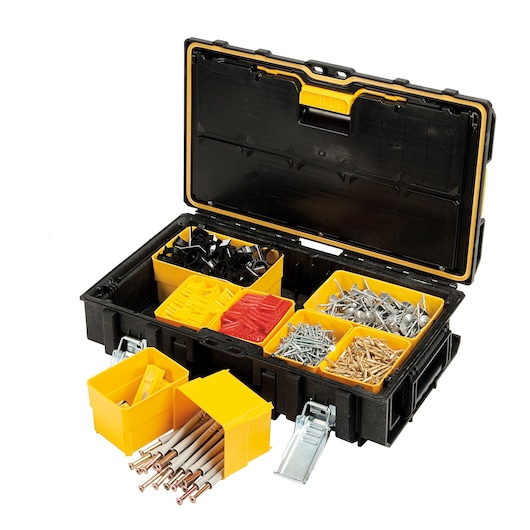 A DEWALT black and yellow plastic organizer box is open, showing multiple compartments containing assorted screws, nails, anchors, fasteners, and other hardware.