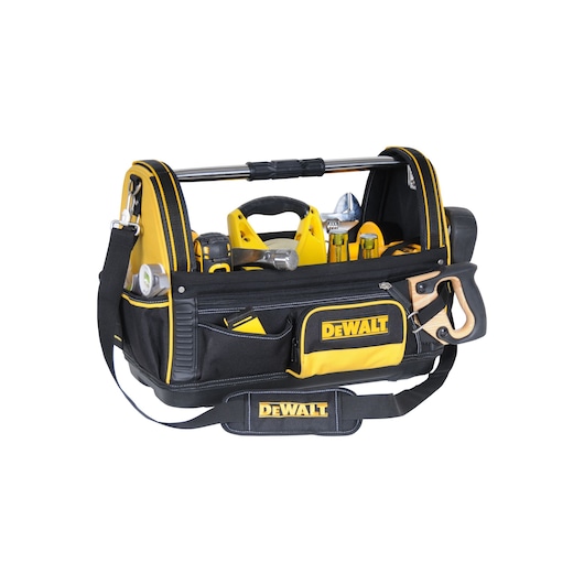 DEWALT branded open tool bag with a metal handle, filled with assorted tools including a saw, tape measure, screwdrivers, and a spirit level. The bag is black and yellow, with an adjustable shoulder strap and several exterior pockets.