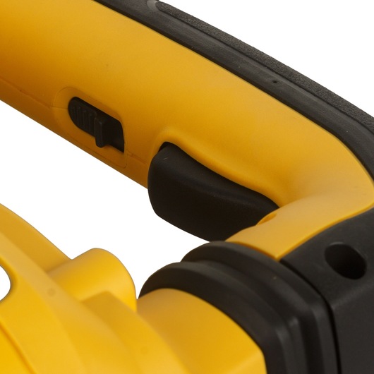 Close-up view of a yellow and black DEWALT power tool handle, featuring a black trigger and a slider switch.