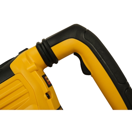 Close-up of the handle and trigger area of a yellow and black DEWALT power tool.