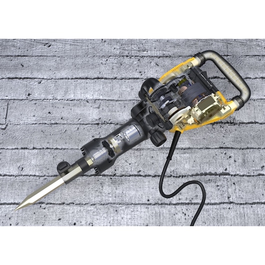 Cutaway view of a DEWALT electric jackhammer, model D25961K, showing internal mechanical components, the pointed chisel attachment, and power cord, displayed on a concrete surface.