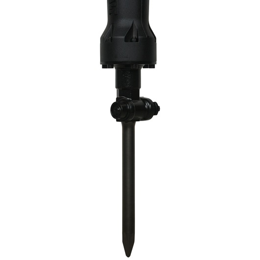 Close-up view of the lower part of a DEWALT demolition hammer, model D25961K, featuring a pointed chisel attachment.