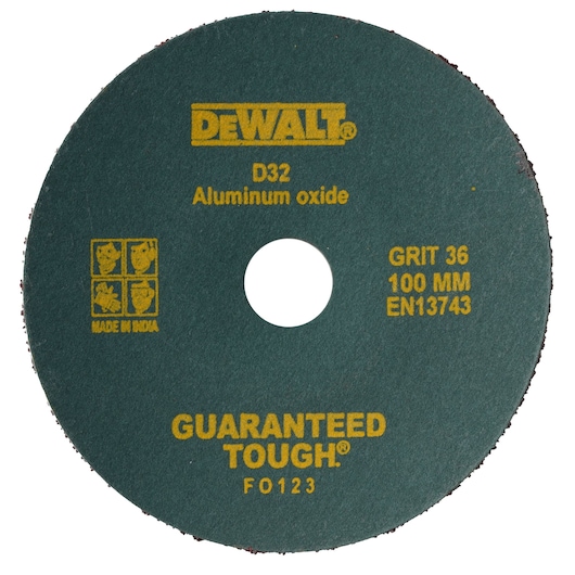 A round DEWALT aluminum oxide grinding or cutting disc, model D32, with yellow text indicating GRIT 36, 100 mm diameter, and EN13743 standard. The disc includes safety pictograms and the phrase 'GUARANTEED TOUGH' printed on it.