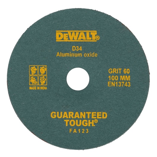 A green DEWALT aluminum oxide grinding or cutting disc labeled D34, grit 60, diameter 100 mm, with EN13743 standard. Yellow text includes 'GUARANTEED TOUGH' and 'MADE IN INDIA' with safety icons.