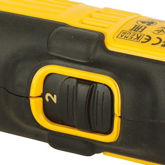 Close-up view of a black and yellow switch with a number 2 on a DEWALT power tool.
