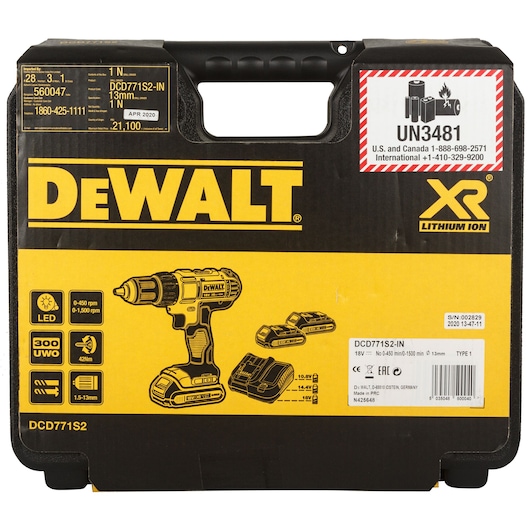 Front view of a black and yellow DEWALT hard carrying case for an XR Lithium Ion cordless drill, model DCD771S2. The case displays graphics of a drill, two batteries, and a charger, along with various product specifications such as LED light, 0-450/0-1500 rpm speeds, 300 UWO, 42Nm, and 1.5-13mm chuck size. There is a UN3481 battery warning label and contact information on the case.