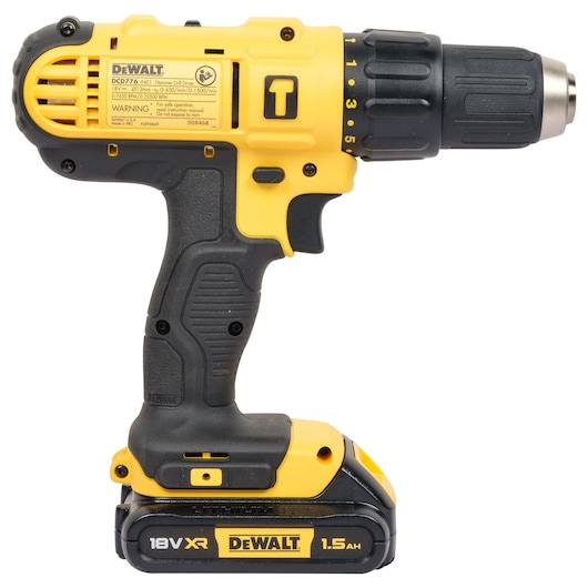 A yellow and black DEWALT cordless drill, model DCD776S2A, shown from the side with its battery attached. The drill has a comfortable grip and adjustable settings on the chuck.