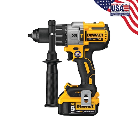 DEWALT 20V Max XR cordless drill with side handle and 5.0 Ah lithium-ion battery, displayed against a white background. The drill shows branding and a label stating 'Made in the USA with global materials' in the top right corner.