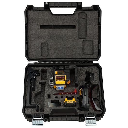A hard plastic carrying case containing a DEWALT laser level kit with various components. The foam insert securely holds the yellow and black laser level device, a battery, a charger, mounting accessories, protective glasses, and other parts.
