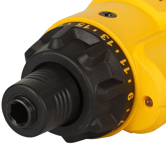 Close-up view of a yellow DEWALT power tool with a partially visible black attachment. The product identification and details are obscured in the center part of the image.