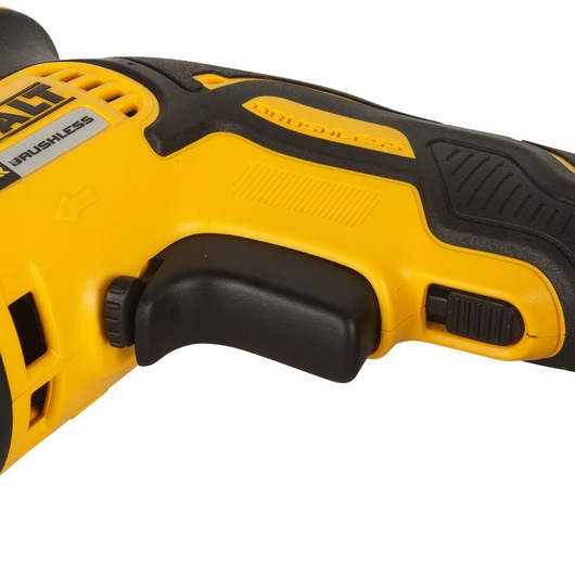 Close-up view of the handle and trigger of a yellow and black DEWALT brushless power tool.