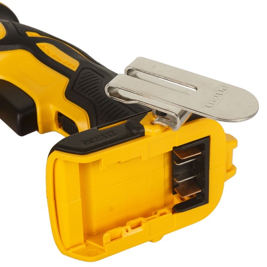 Close-up view of the DEWALT DCF620NT-XJ cordless tool handle, showing the battery compartment and a metal belt clip attached.