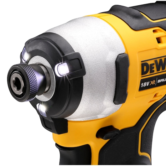Close-up of a DEWALT 18V XR impact driver with LED lights near the chuck for better visibility during use.
