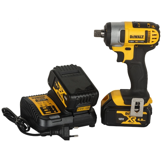 DEWALT 18V XR Li-Ion cordless impact wrench with 4.0Ah battery, shown next to its battery charger.