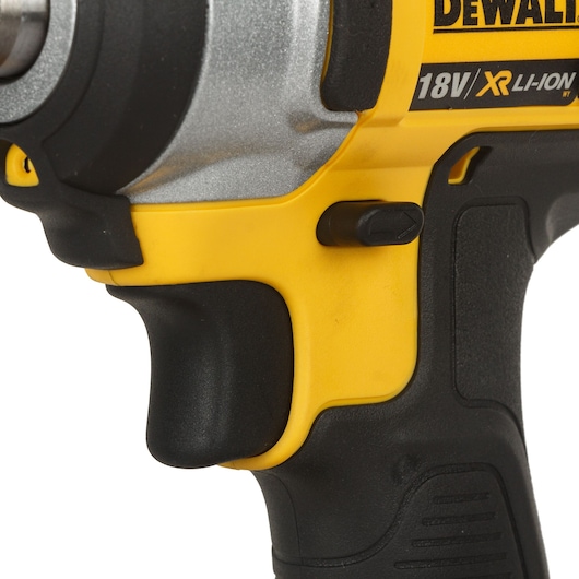 Close-up of a DEWALT 18V XR Li-Ion cordless power tool handle and trigger.