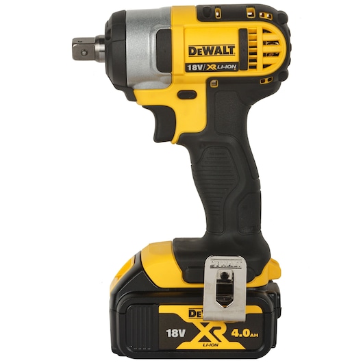 A DEWALT 18V XR Li-Ion cordless impact wrench with a black and yellow ergonomic design, featuring a 4.0 Ah battery attached at the base and a metal belt clip on the side.