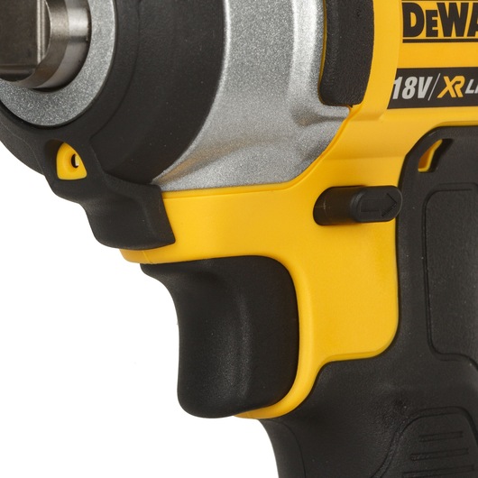 Close-up of a DEWALT 18V cordless impact wrench, showing the handle, trigger, and part of the metal head.
