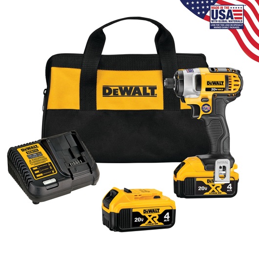 DEWALT cordless impact driver kit, including a yellow and black power tool, carrying bag with DEWALT logo, 20V battery charger, and two 20V XR lithium-ion batteries. A 'Made in USA with Global Materials' label is visible in the upper right corner.