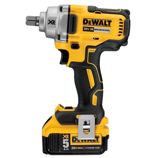 A Dewalt 20V XR brushless cordless impact wrench with a black and yellow design, featuring a rechargeable lithium ion battery, shown against a white background.