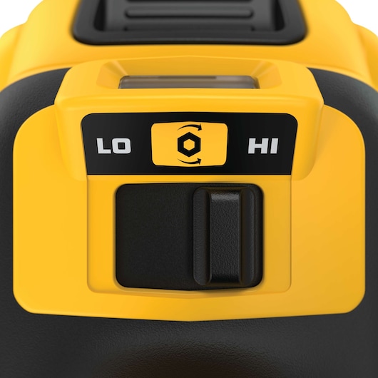 Close-up view of a DEWALT power tool speed control switch with a yellow and black design. The switch is set between 'LO' (low) and 'HI' (high) settings, and there is a rotational bolt icon in the center.