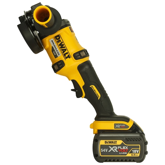 A DEWALT brushless power tool, specifically a 54V XR FlexVolt cordless angle grinder with yellow and black design, featuring a detachable battery pack.
