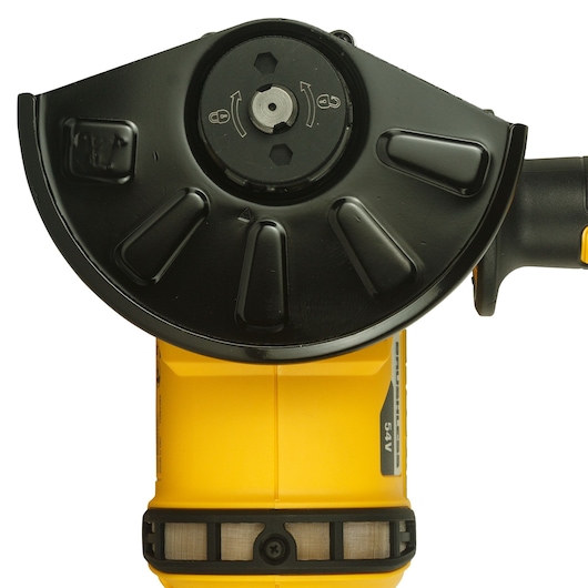 Close-up view of the DEWALT DCG414T2 angle grinder showing the black guard and blade mount on the yellow body. The grinder is part of a 54V cordless power tool range.