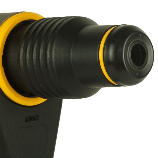 Close-up image of the front section of a DEWALT power tool, showing its black and yellow plastic housing and nozzle.