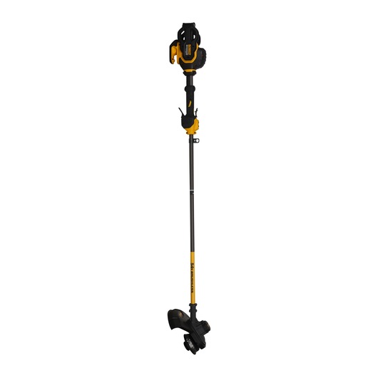 A DEWALT DCM571N cordless brushless string trimmer with a yellow and black design, shown standing upright against a white background.