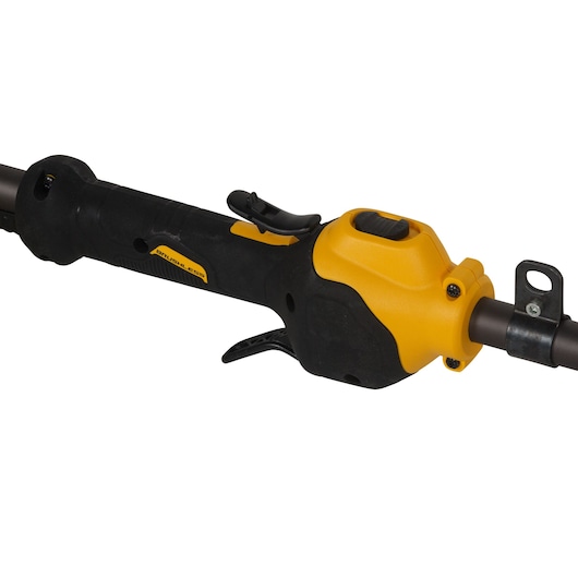 Close-up of the handle and control section of a DEWALT power tool, featuring a black and yellow design with a trigger and switch.