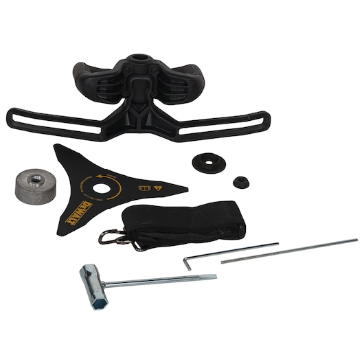 A set of DEWALT accessories and parts for a garden power tool, including a black protective guard, a metal blade, a metal weight, various mounting hardware, a black strap, and several metal tools, all arranged on a white surface.