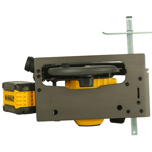 A DEWALT DCS575T2 cordless circular saw in yellow and black, shown from the side with a metal guide attached.