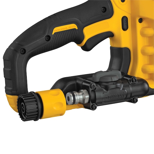 Close-up view of a DEWALT power tool handle with a black and yellow brushless grip and a detailed attachment connection point.