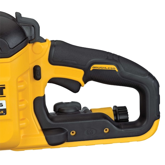 Close-up of the handle and control section of a DEWALT DCS690X2 brushless power tool, featuring a yellow and black ergonomic grip and visible switches.