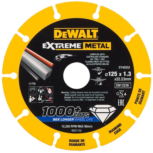 A DEWALT Extreme Metal diamond edge cutting wheel, model DT40252. The disc is yellow and black, labeled for metal cutting, 125mm diameter with 1.3mm thickness and 22.23mm bore. It advertises '1000+ cuts' and '30x longer wheel life'. Several safety and usage icons are visible.
