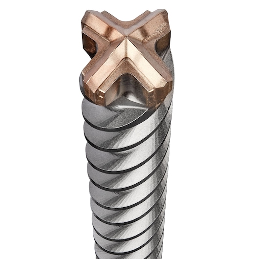 Close-up view of a DEWALT drill bit with a copper-colored, cross-shaped cutting tip and spiral grooves along the shaft.