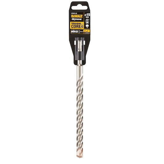 DEWALT DT9575 Tough Core Extreme drill bit for concrete, shown in its retail packaging. The drill bit has a twisted metal shaft and a carbide tip, with 15 mm diameter indicated on the package.