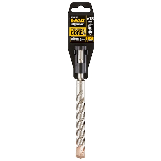 A DEWALT Extreme Tough Core drill bit, packaged, with 18mm diameter indicated on the label. The bit features a spiral design and is intended for heavy-duty drilling applications.