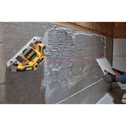 Laser square being used at a construction site.