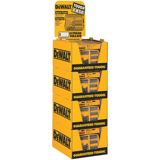 A display stand featuring multiple yellow DEWALT Tough Case sets for drill bits and accessories. The stand is branded with DEWALT logos and the phrase 'Guaranteed Tough.' Each case is visible through cutouts in the packaging.