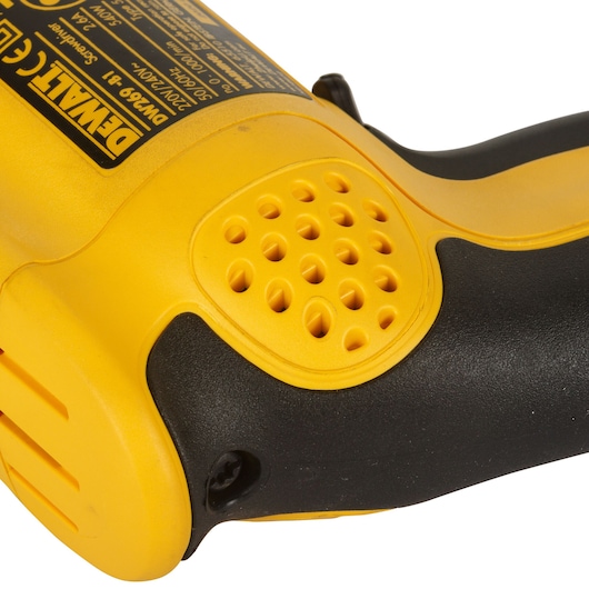Close-up image of a DEWALT DW269 electric tool handle, showing its yellow and black ergonomic grip and ventilation holes.