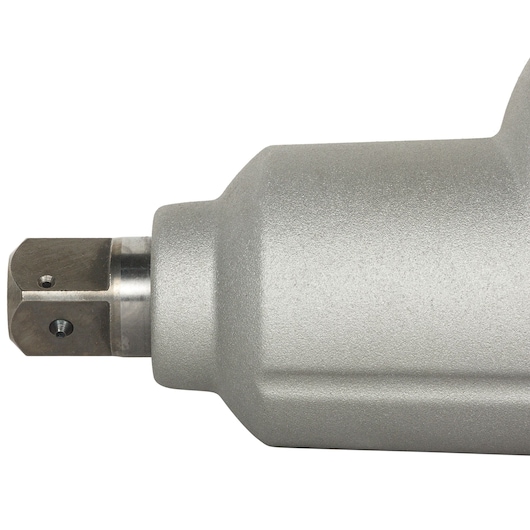 Close-up view of a metallic tool component, showing the end and textured surface of the device.