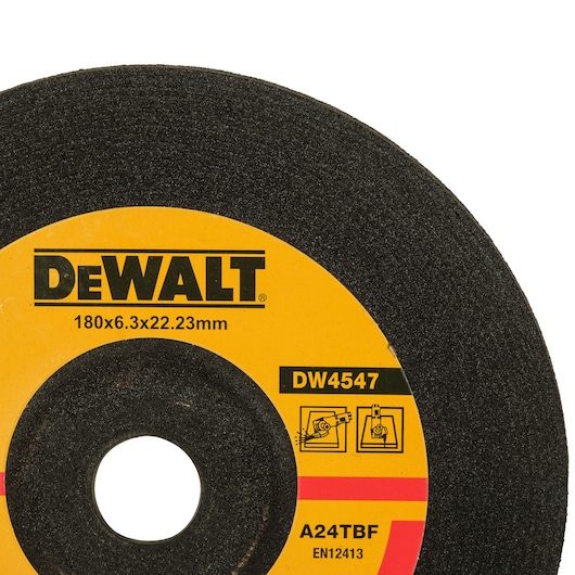 Close-up image of a DEWALT DW4547 abrasive cutting disc, showing the brand logo, model number, and specifications (180x6.3x22.23mm) printed on the yellow label.