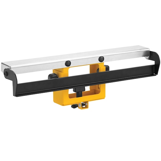 A DEWALT DW7029 adjustable material stop accessory, featuring a yellow and black base with a silver horizontal bar on top. The accessory is used for positioning and securing materials on a miter saw stand.