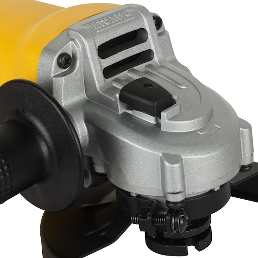 Photo of DEWALT angle grinder DW802, close-up, silver and black body with side handle, on white background.