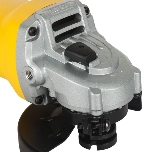 Close-up view of a DEWALT DW810 angle grinder showing its metallic and yellow body, protective guard, and control buttons.