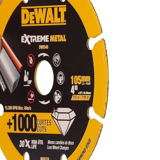 Close-up of a DEWALT Extreme Metal cutting disc, model DW8540, showing yellow and black color scheme, 105mm (4 inch) diameter, designed for metal cutting with a diamond edge, capable of over 1000 cuts, and marked with product details and safety icons.