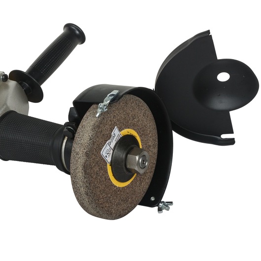 Close-up image of a DEWALT DW882 angle grinder showing the abrasive wheel, protective guard, and handle.