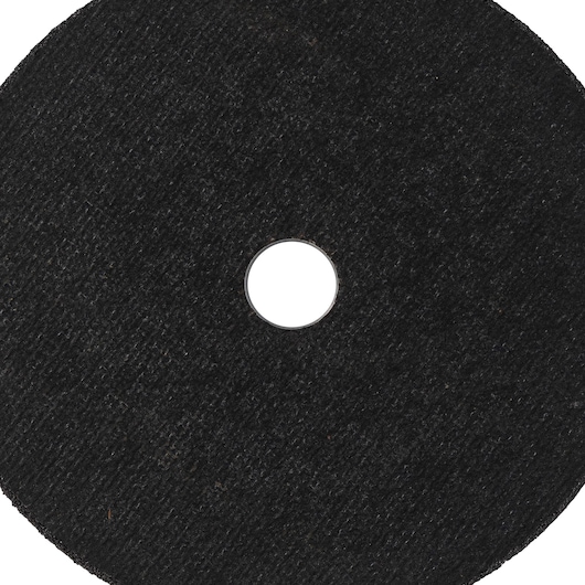 Close-up image of a round black abrasive cutting disc with a central hole, used for cutting materials in power tools.
