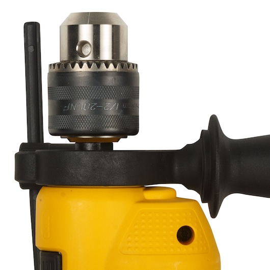 Close-up image of the chuck and handle of a yellow DEWALT power drill.