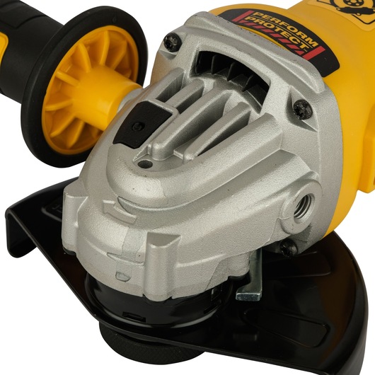 Close-up view of a DEWALT angle grinder with a yellow handle and metal gear housing, featuring a side safety guard.